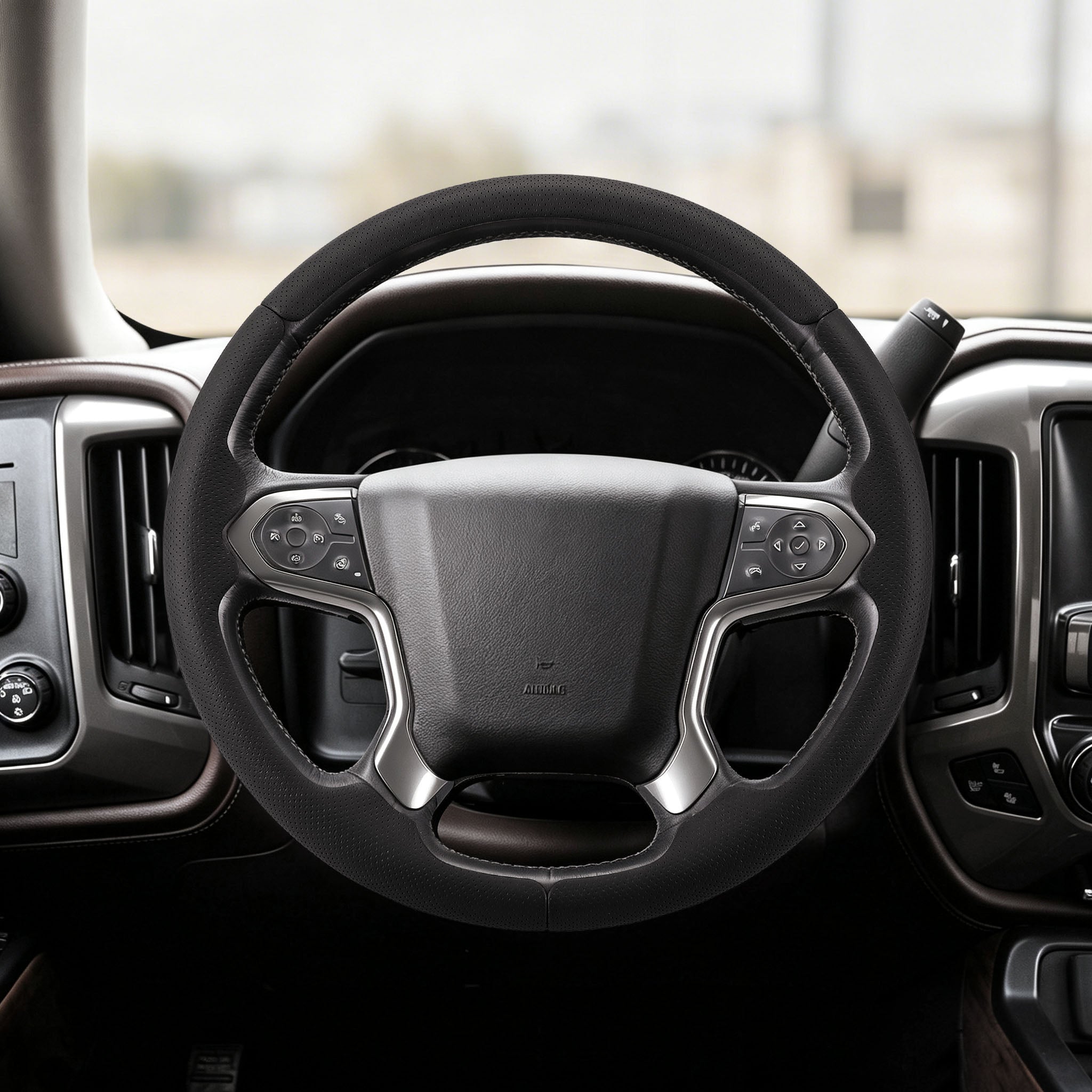Front installed view of black perforated leather 3-piece steering wheel cover for Chevy Silverado 1500 2014-2018