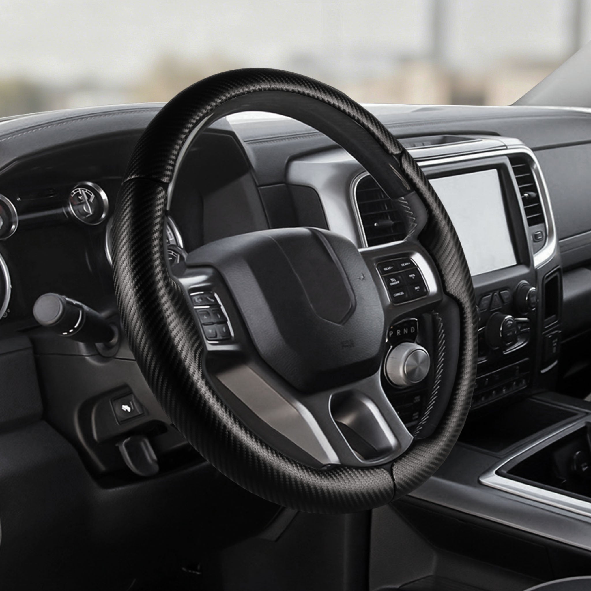 Cockpit view of black perforated leather 3-piece steering wheel cover for Dodge Ram 1500 2012-2018