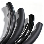 Close-up comparison of black leather and black carbon-fiber-style 3-piece steering wheel cover finishes for Ford F-150 2015-2020 & F-250/F-350/F-450/F-550 2017-2021#color=black
