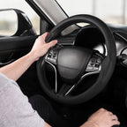 Installed view of black perforated leather 3-piece steering wheel cover for Honda Civic 2016-2021 & Clarity 2018-2021 with driver holding the wheel#color=black perforated leather