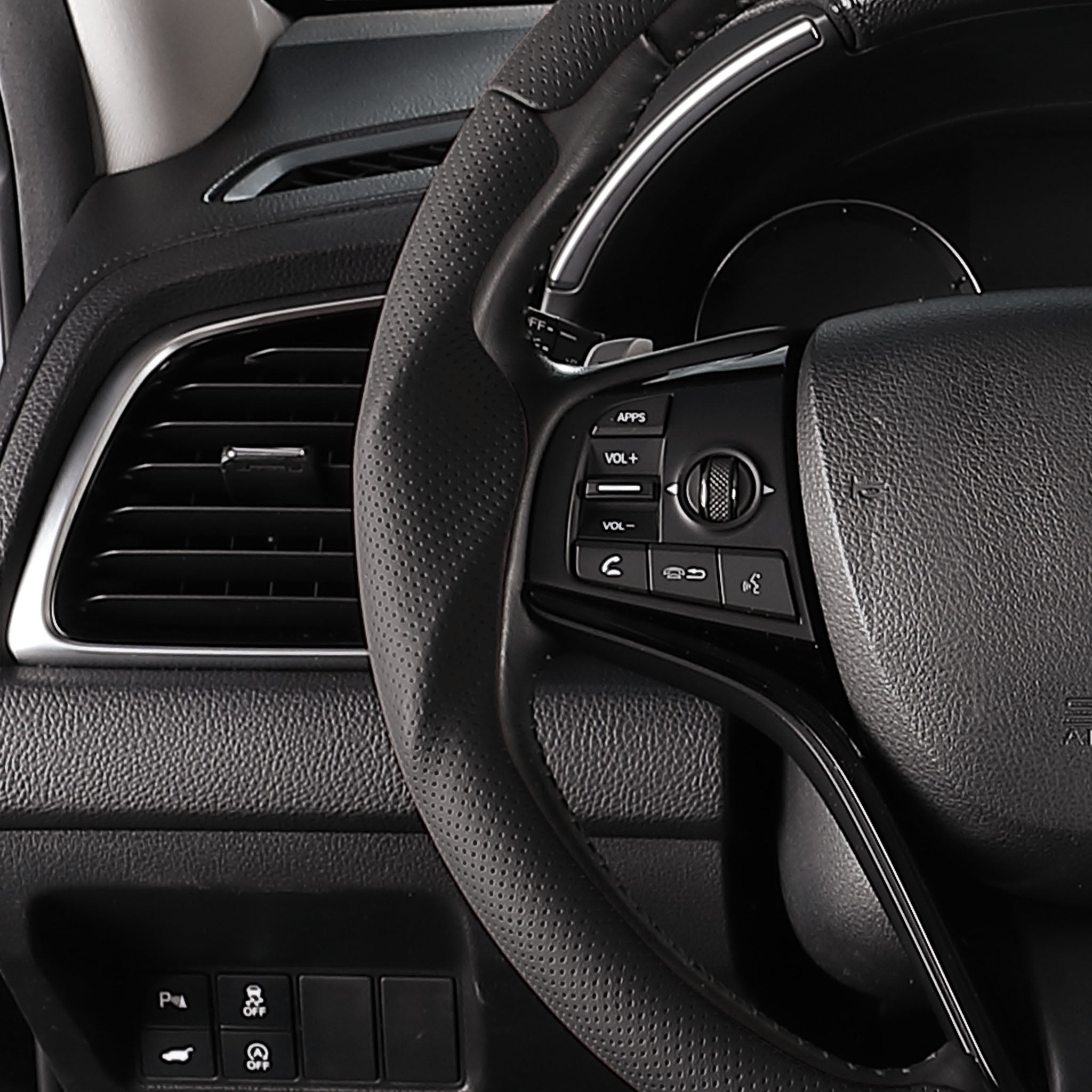 Close-up of a black perforated leather 3-piece steering wheel cover for Honda Civic 2016-2021, showing its ergonomic 3D contours and precise custom fit