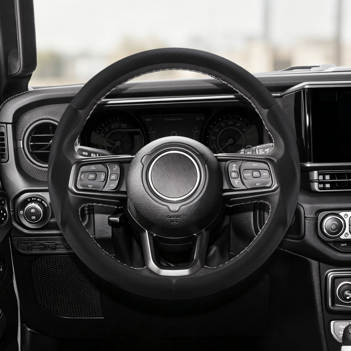 Front installed view of black perforated leather 3-piece steering wheel cover for Jeep Wrangler 2018-2026