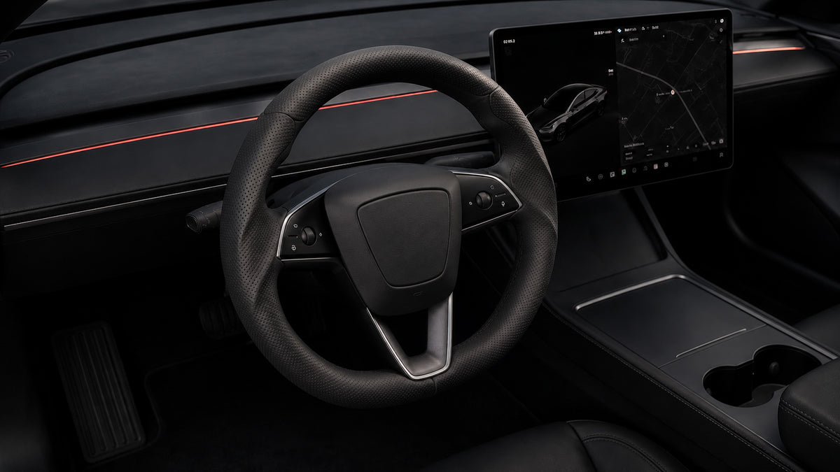 SUV and crossover steering wheel cover collection featuring a black perforated leather cover in a Tesla Model Y interior