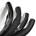 Close-up comparison of black leather and black carbon-fiber-style 3-piece steering wheel cover finishes for Toyota Camry 2015-2017 & Camry SE 2012-2014#color=black
