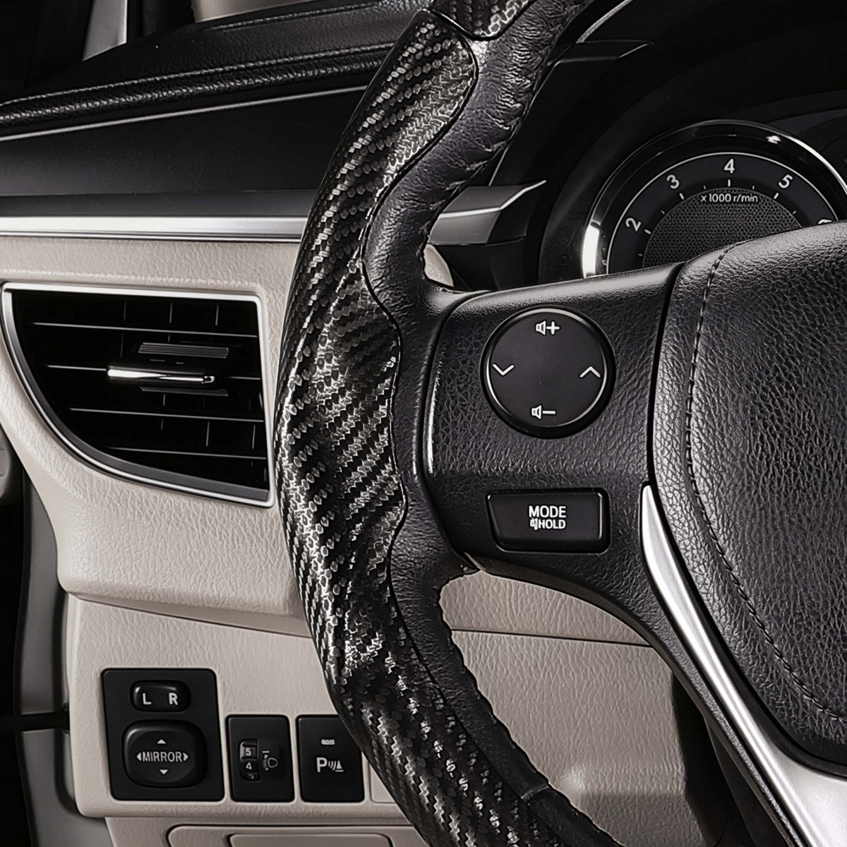 Close-up of a matte black carbon-fiber-style 3-piece steering wheel cover for Ford Toyota Camry 2015-2017, showing its ergonomic 3D contours and precise custom fit