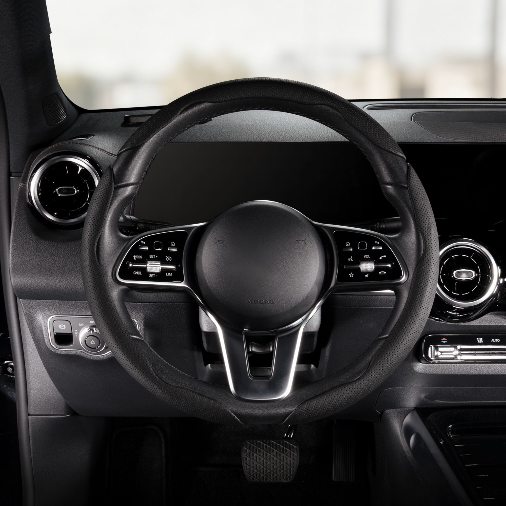 Front installed view of black perforated leather 3-piece steering wheel cover for 14.5-15 Inch Wheels