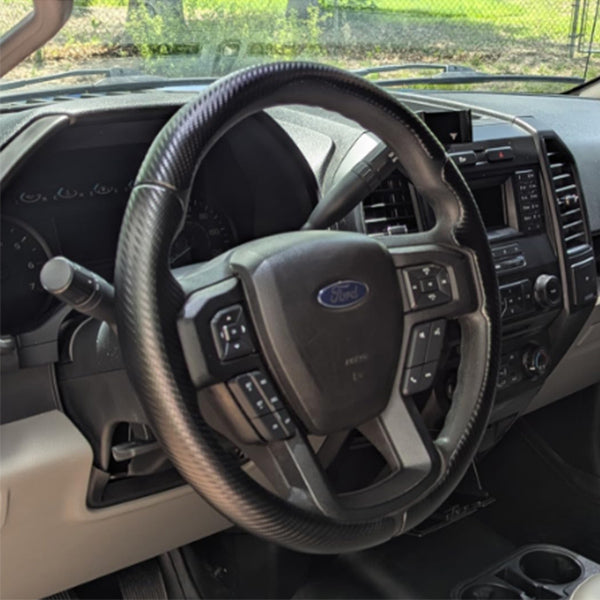 Customer installed LOPHNIX steering wheel cover on Ford vehicle interior