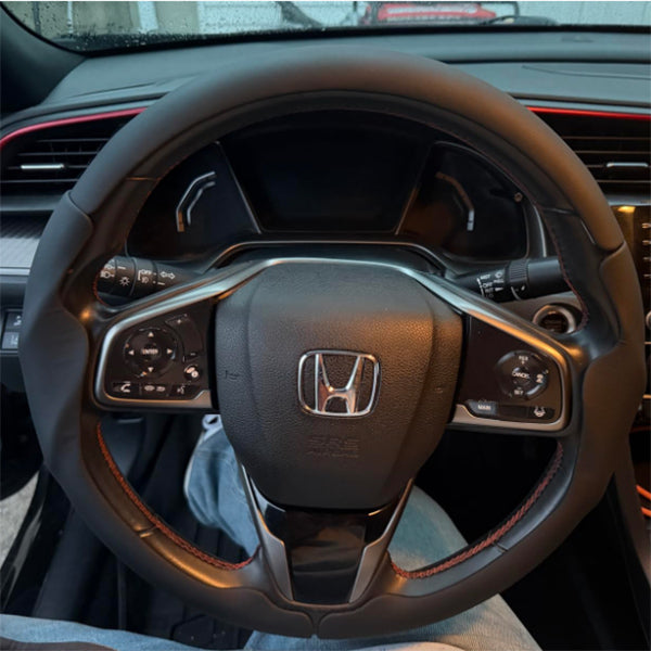Customer installed LOPHNIX steering wheel cover on Honda vehicle interior