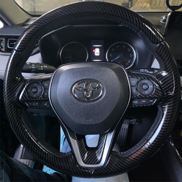 Customer installed LOPHNIX steering wheel cover on Toyota vehicle interior
