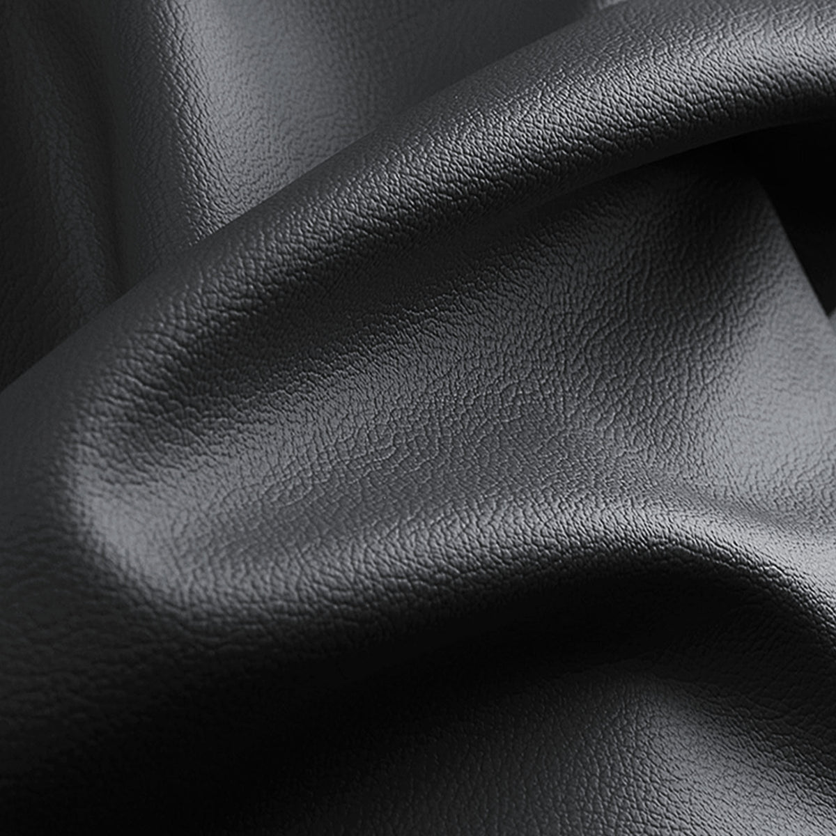 Close-up of fine-grain black leather material used on LOPHNIX steering wheel covers