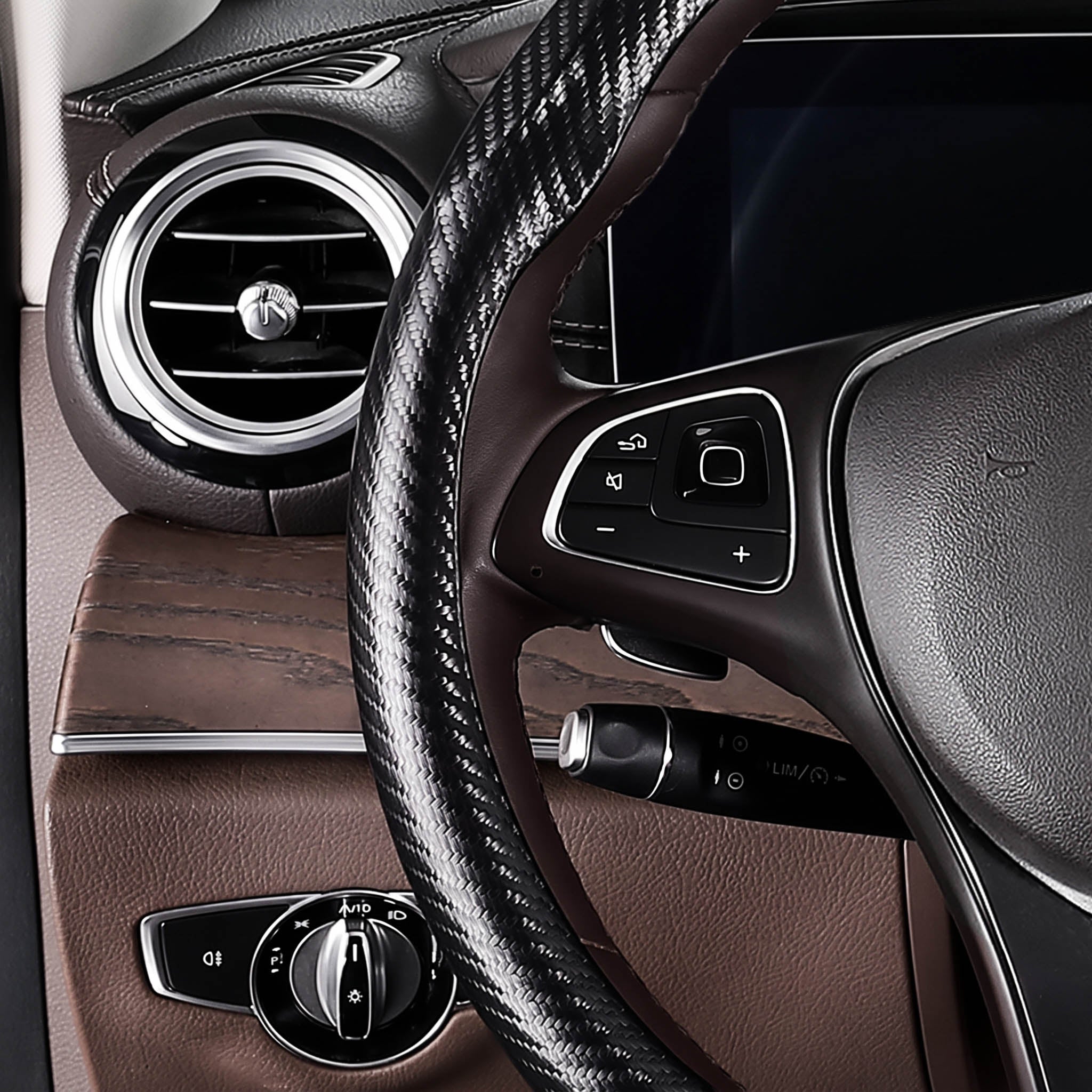 Close-up of a matte black carbon-fiber-style steering wheel cover for 14.5-15 Inch Wheels