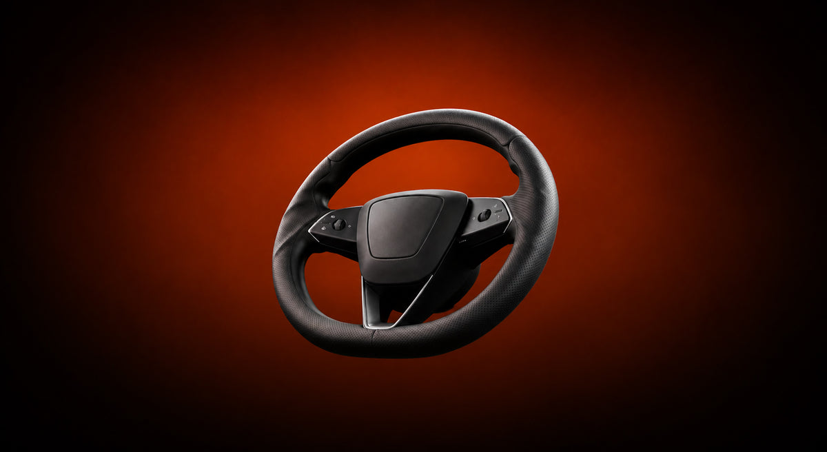 Custom-fit black perforated leather 3-piece steering wheel cover by LOPHNIX on a dark orange background